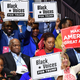 Herman Cain (center) attends a rally for President Donald Trump at the BOK Center on June 20, 2020 in Tulsa, Oklahoma.